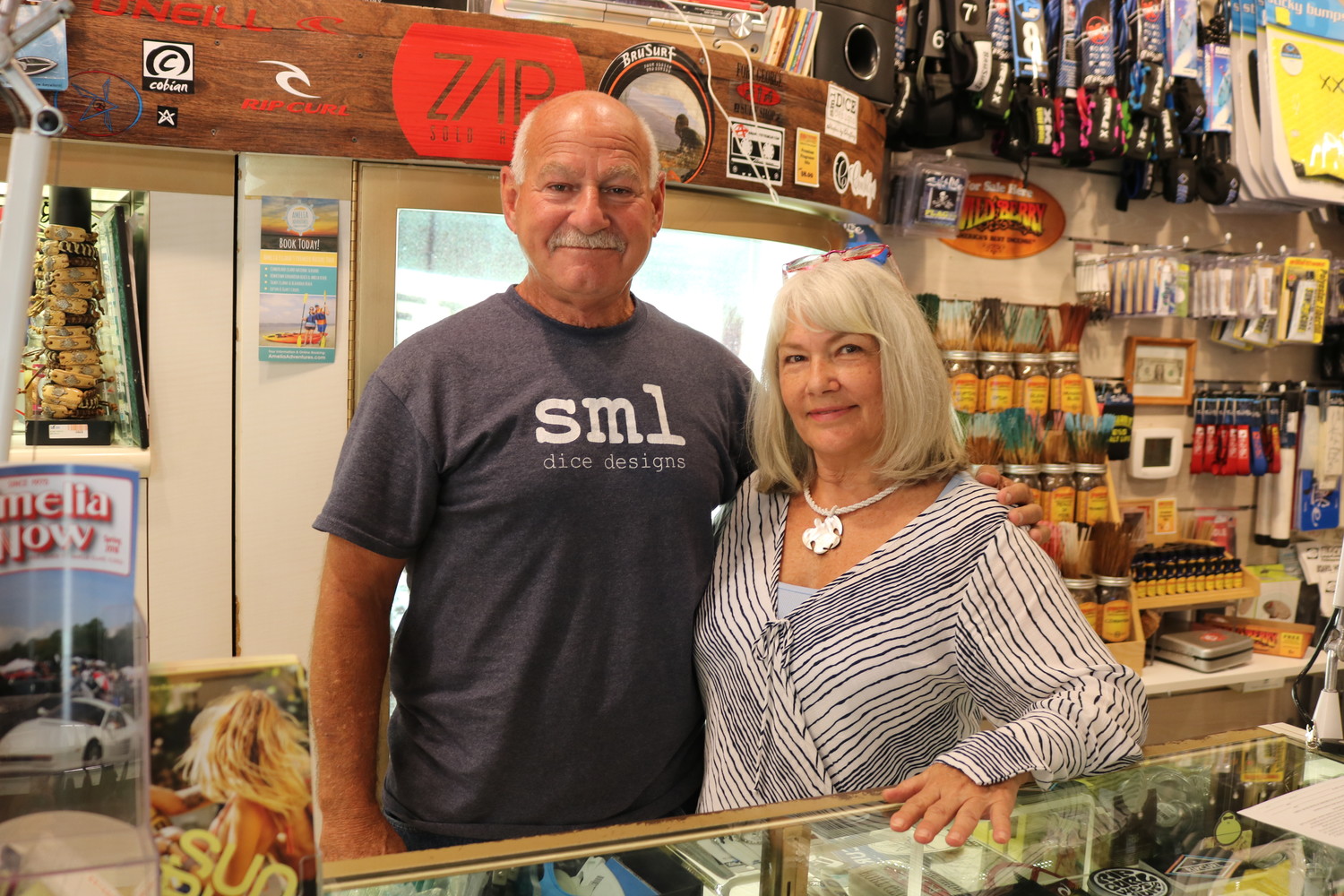 Fort George Surf Shop owner Jim Rodgers with his wife Debi